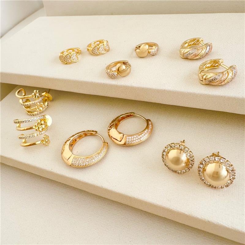 BRINCO BOLA CRAVEJADA BANHO OURO 18K