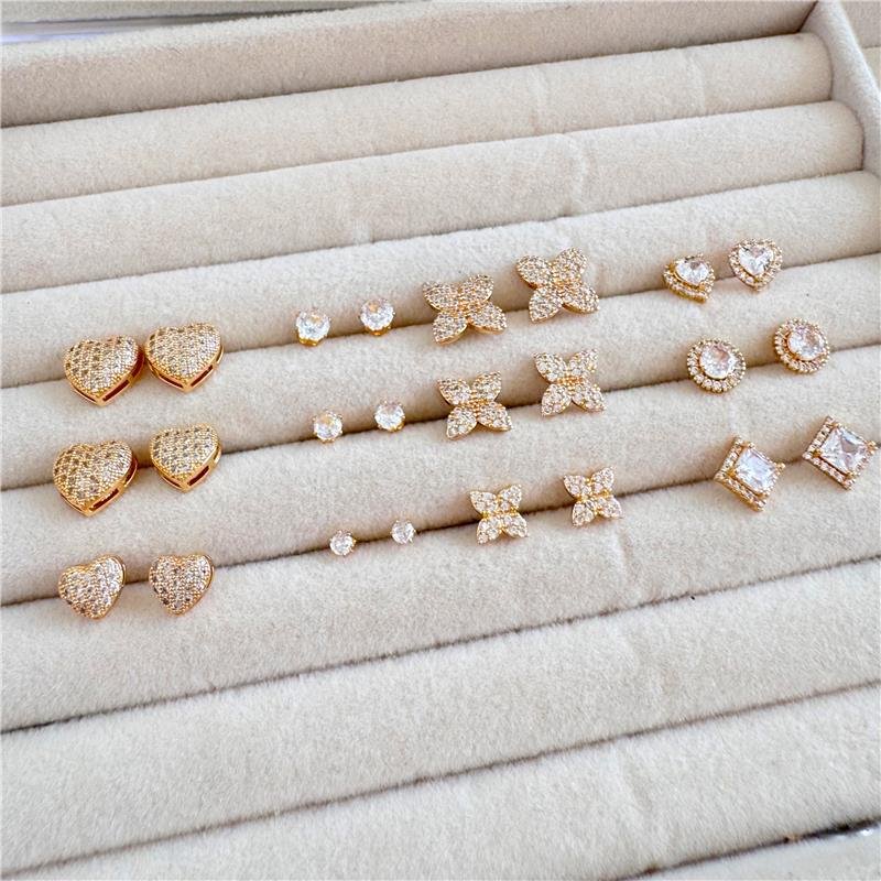 BRINCO TRIO CORAÇÃO CRAVEJADO BANHO OURO 18K