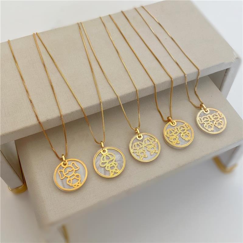 COLAR MADRE PÉROLA 1 MENINA BANHO OURO 18K