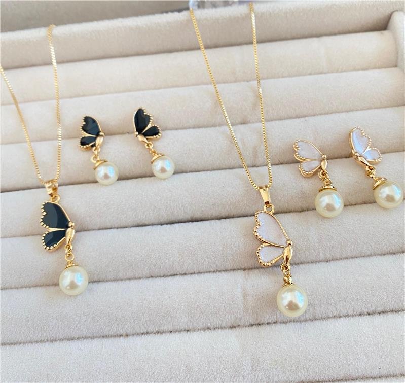  CONJUNTO MEIA BORBOLETA ÔNIX COM PÉROLA BANHO OURO 18K