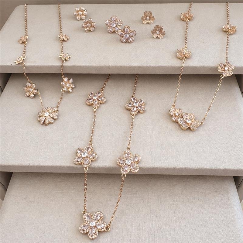 CONJUNTO FLORES BAGUETE CRISTAL BANHO OURO 18K 