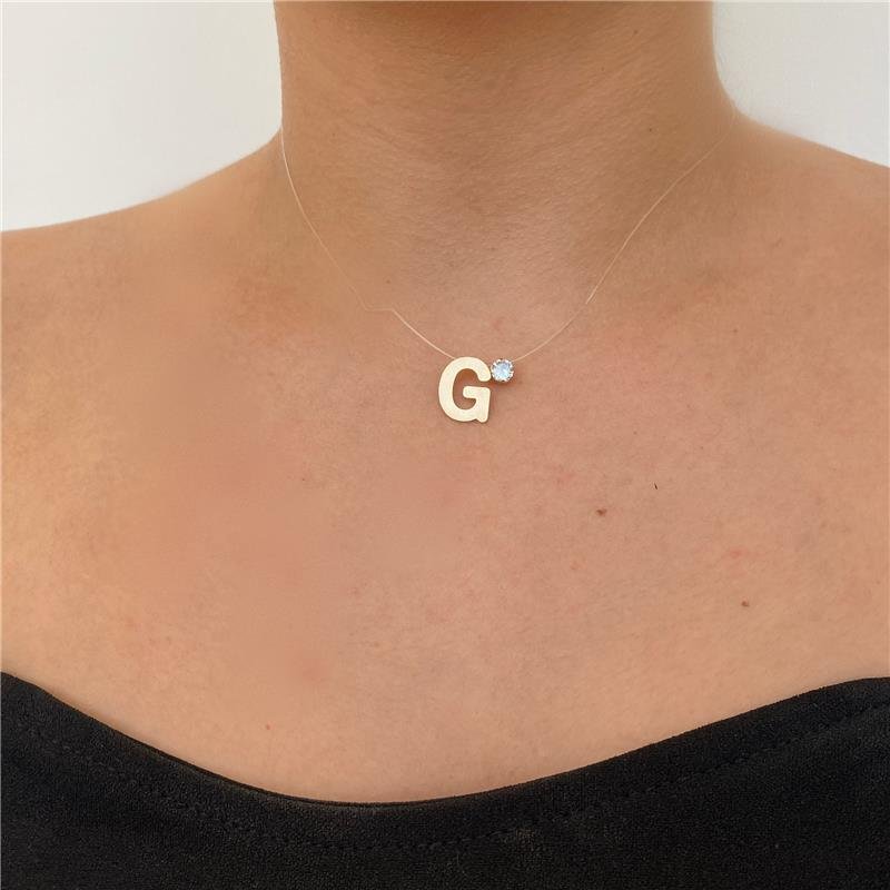 COLAR FIO DE NYLON COM LETRA E PONTO DE LUZ BANHO OURO 18K