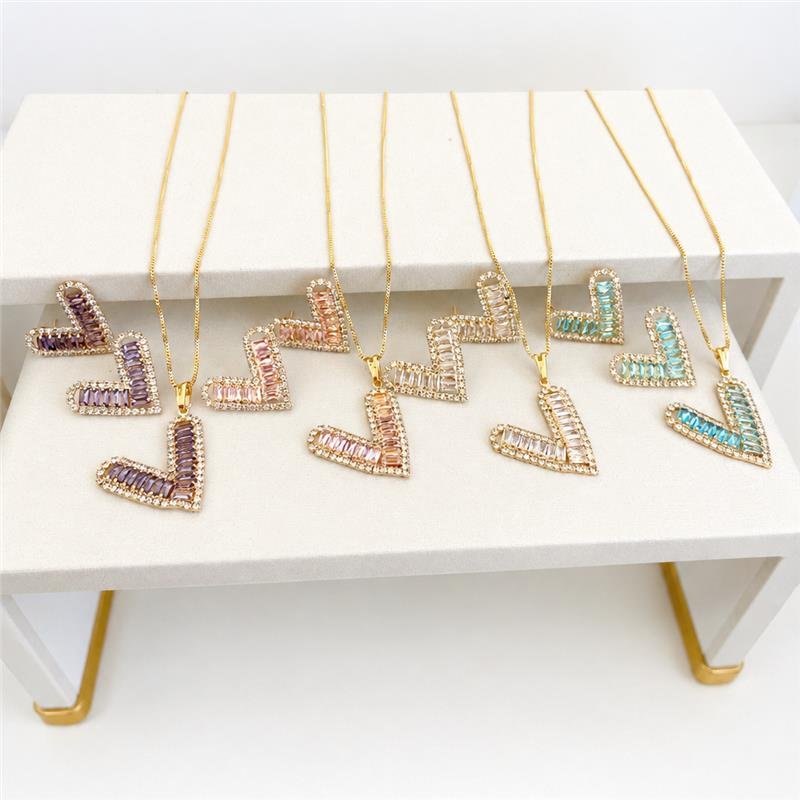 CONJUNTO CORAÇÃO BAGUETES LILÁS BANHO OURO 18K