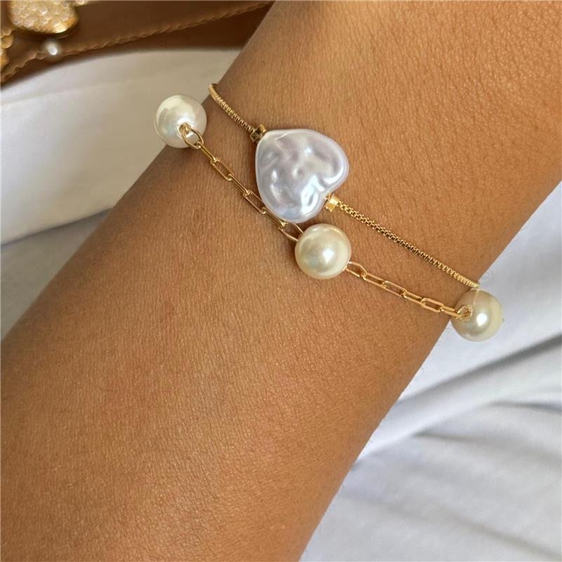 PULSEIRA CORAÇÃO PÉROLADO GRAVATINHA BANHO OURO 18K 