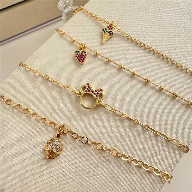 PULSEIRA INFANTIL MORANGO CRAVEJADO BANHO OURO 18K