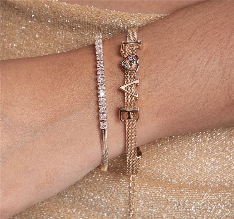  PULSEIRA LOVE COM DETALHE CORAÇÃO CRAVEJADO BANHO OURO 18K